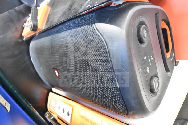 JBL PartyBox 110 speaker on display; features control panel with power and Bluetooth buttons. Excellent condition.