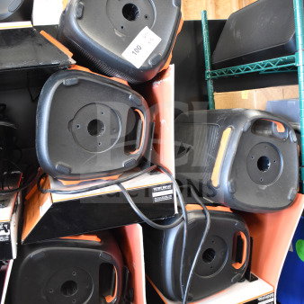 5 JBL speakers displayed on store shelves, in good condition. Includes visible tags indicating auction and promotional details.