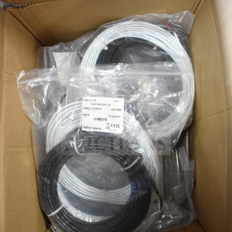 Box containing 8 items including wires, Sensormatic 0352-0659-01 Ethernet isolator. Labeled bags visible.