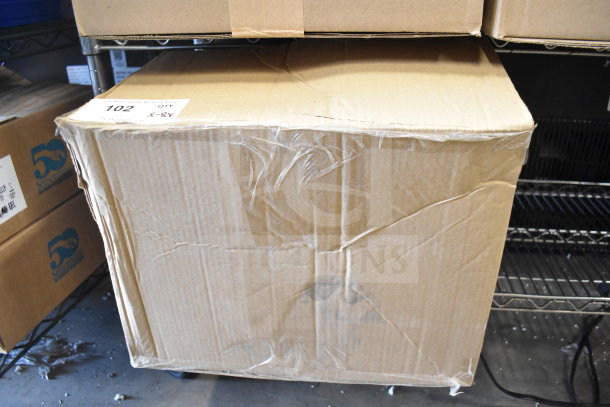 Cardboard box containing 8 items, including Sensormatic 0352-0659-01 Ethernet Isolator, sealed and labeled for auction.