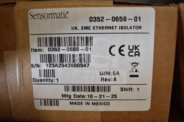 Sensormatic 0352-0659-01 Ethernet Isolator box with label showing item details, barcode, and "Made in Mexico."