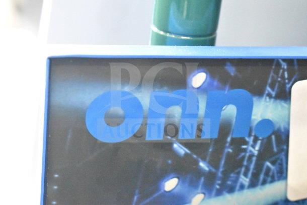 Store display sign featuring the Onn logo on a blue and black background, part of a lot with four displays.