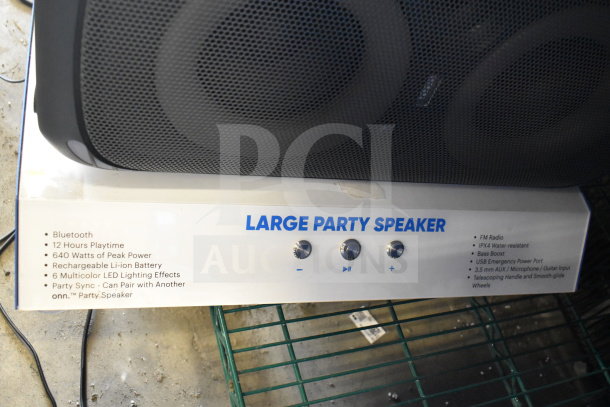 Onn large party speaker display, features Bluetooth, 12-hour playtime, 640W peak power, and multicolor LED effects.