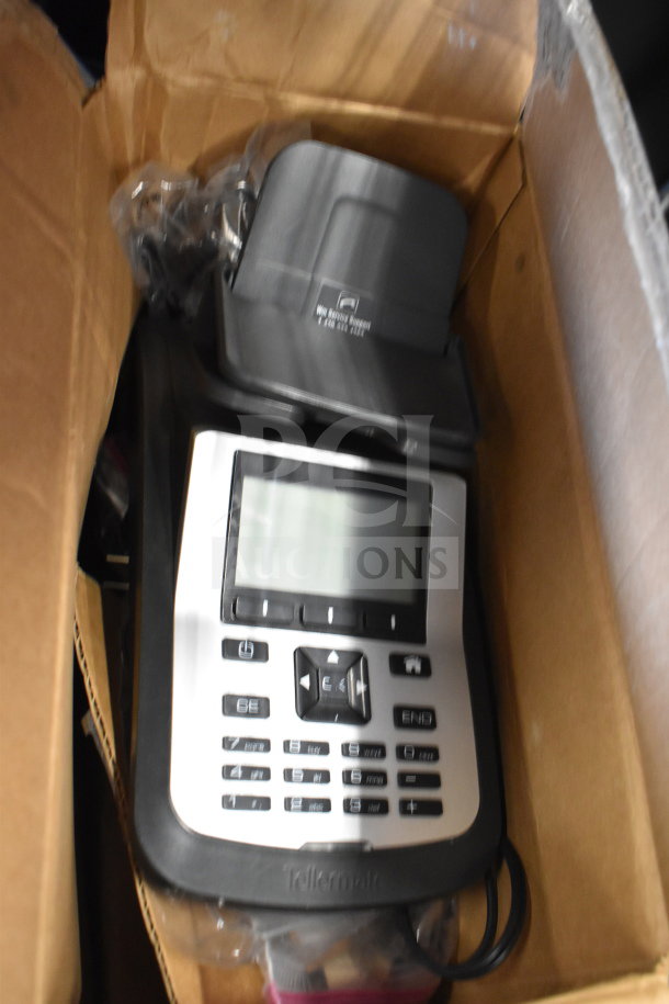 Tellermate Calculator in box, featuring a digital display, keypad, and branded logo. Appears in good condition.