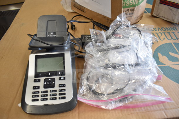 Tellermate calculator with keypad, display screen, attached power cables, and bagged accessories, in good condition.