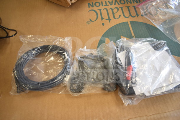 Tellermate Calculator with cables and accessories in original packaging. New, unopened condition, includes all components.