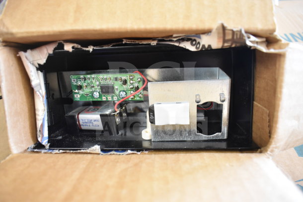 Tellermate Calculator in opened box, showing internal circuit board and power switch, appears in good condition.