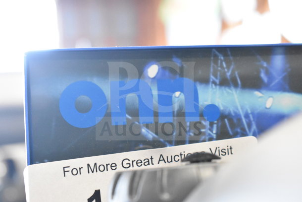 Onn store display featuring logo, accompanied by Samsung speaker and Onn large party speaker, in good condition.
