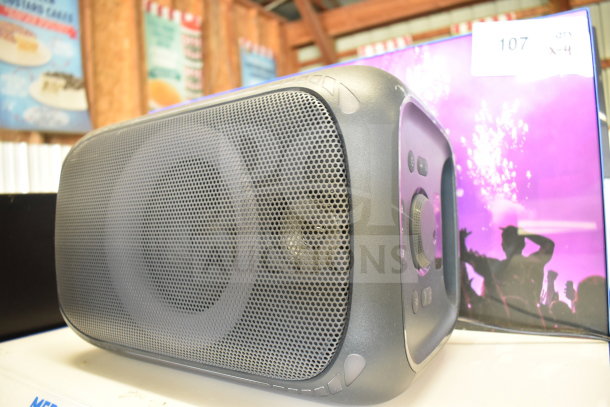 Onn Medium Party Speaker on display, features front grill, control panel, vibrant box art; condition appears new.