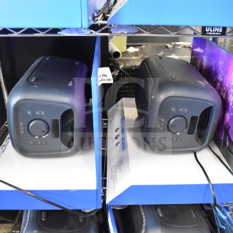 2 store displays with Onn Medium Party Speakers, black, showcasing front controls. Clean condition, promotional setup.