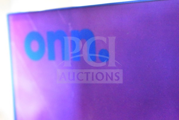 Blue "onn." logo on purple display panel, part of auction for 2 store displays including Onn Medium Party Speaker.