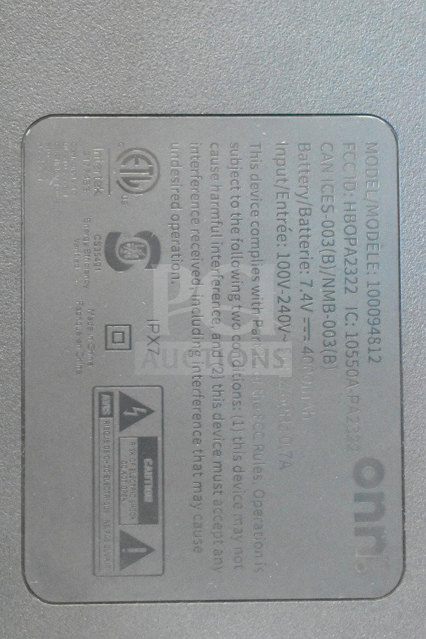 Onn Medium Party Speaker label detailing model 100094812, IPX7 rating, 7.4V, 4000mAh battery. Energy verified, made in China.