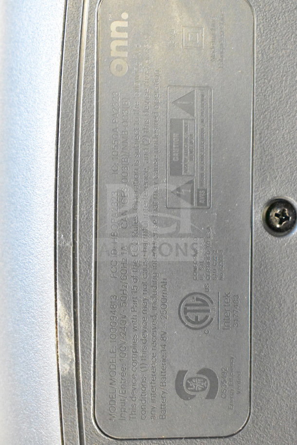 Onn store display label showing model 100094819, input 120V, 60Hz, with specifications and safety certifications.