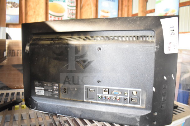 Rear view of a Vizio monitor showing various ports and connections. Slight wear visible on the casing.