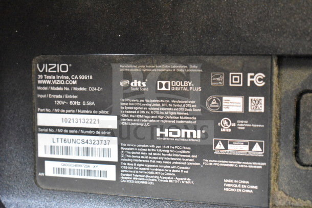Label of Vizio monitor, Model: D24-D1, includes manufacturer details, Dolby, DTS sound logos, and HDMI compliance.