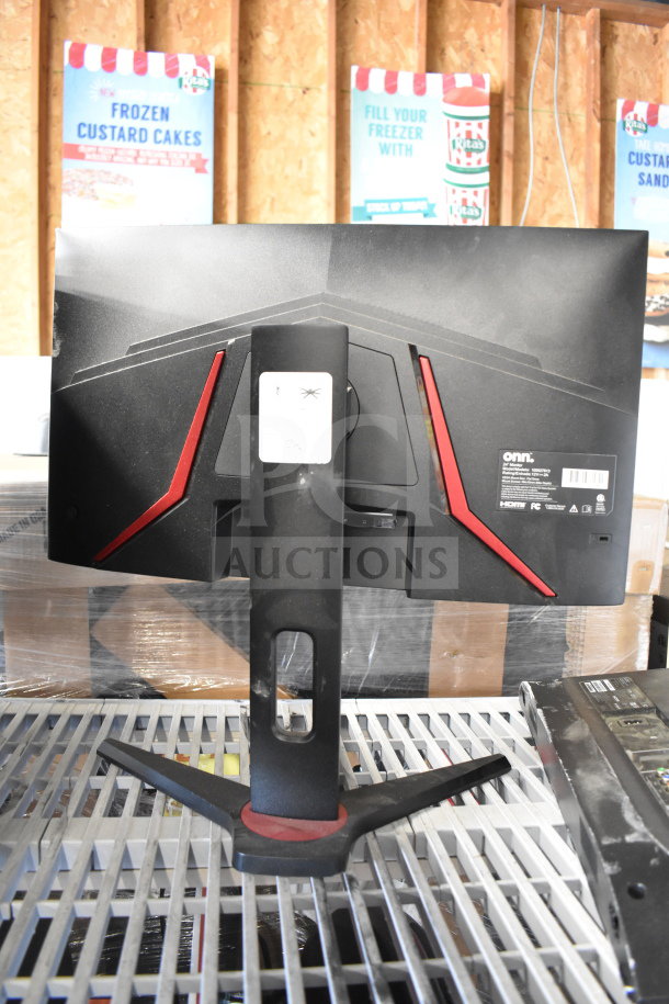 Five monitors including brands Vizio, Onn, MSi, Samsung; black and red design visible, Onn model number on label.