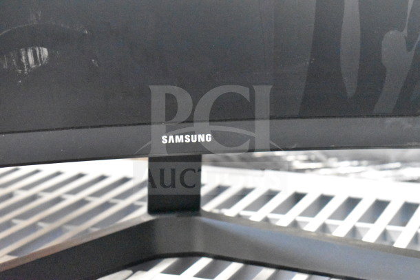 Samsung monitor in good condition. Part of a set of five monitors including Vizio, Onn, MSi, and additional Samsung.