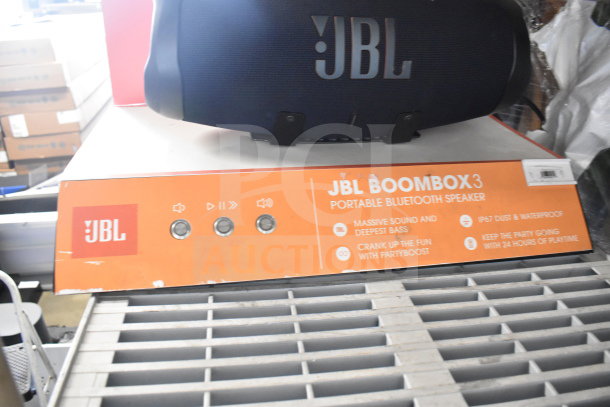 JBL Boombox3 portable Bluetooth speaker display, featuring massive sound, IP67 waterproof rating, and 24-hour playtime.