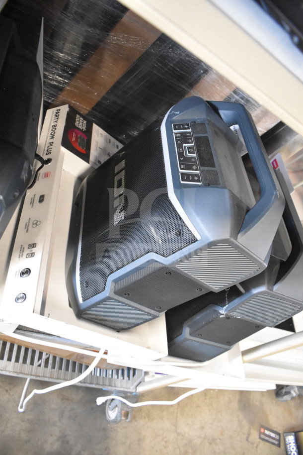 "Store display with Ion speaker and other electronics, in good condition. Visible Ion branding and controls."