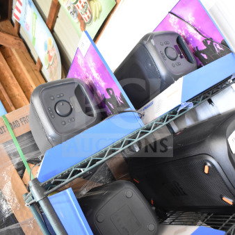 Store display with three Onn medium party speakers, featuring control panels and handles, in good condition. Auction bid opportunity.