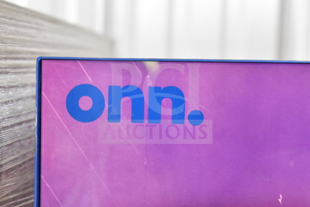 Onn branded display with medium party speaker included, featuring vivid purple backdrop.