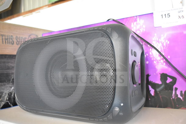 Onn Medium Party Speaker, black, with front grille and control panel; part of auction display, minor wear visible.