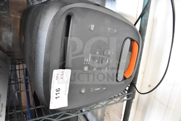 JBL PartyBox 310 speaker with control panel, orange handle, and visible auction tag labeled "116 QTY X2". Appears in good condition.