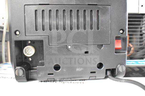 Back view of the Nuova Simonelli OSCAR II AD espresso machine, showing power switch and vent. Brand new, 2025 model.