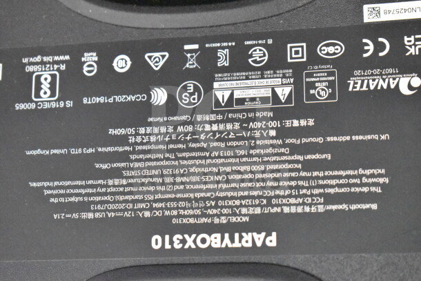 "PARTYBOX310 label showing model, voltage, and compliance info on JBL PartyBox 110 Speaker store display item."