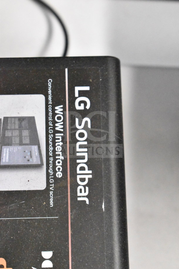 LG Soundbar with WOW Interface label, features convenient control through LG TV screen. Ideal for gaming displays.