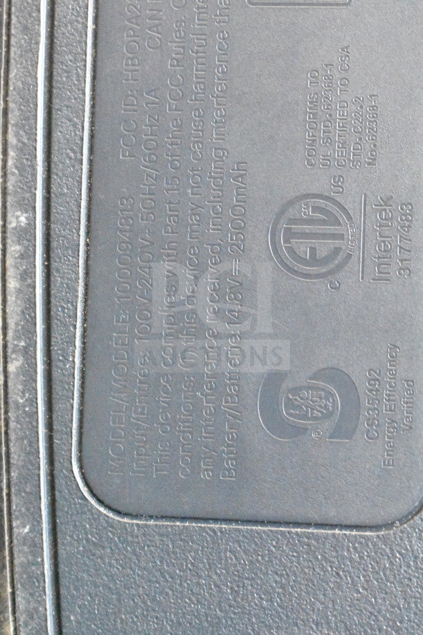 Displays rear panel label of Onn Large Party Speaker, model 100094813. Shows input, battery details, and certification marks.