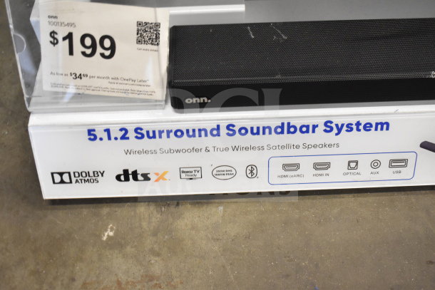 Display featuring Onn 5.1.2 Surround Soundbar System, $199 tag, Dolby Atmos, wireless subwoofer, HDMI, optical, USB inputs.
