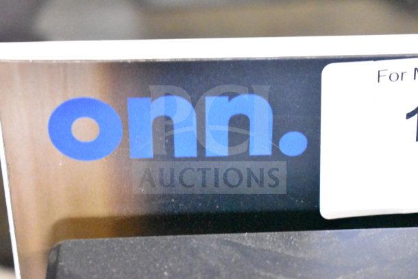 Onn store display featuring soundbars and speakers, brand logo visible. Ideal for showcasing audio equipment.