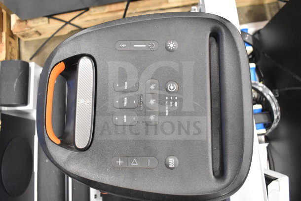 JBL Partybox 310 speaker controls on store display, featuring volume, bass, treble, and connectivity buttons.