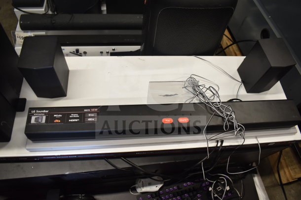 LG Soundbar SS5TR with 5.1 channel, 420W, Dolby, dts, HDMI support. Includes two speakers. Display model condition.