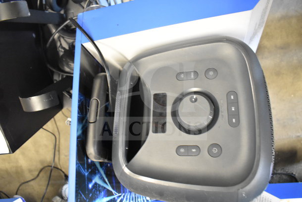 Onn speaker display unit, showcasing control buttons and sleek black design. Good condition, potential double bid value.