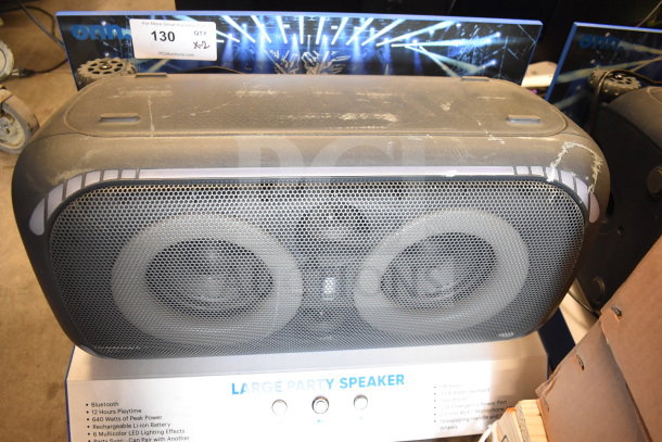 Onn large party speaker with Bluetooth, 12-hour playtime, and 640 watts peak power, shows minor wear on top surface.