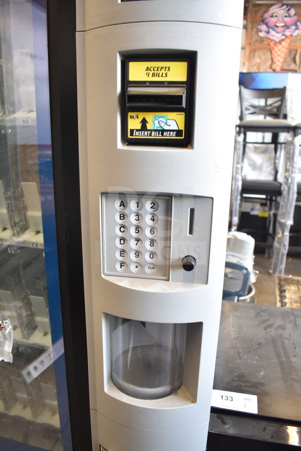 Crane 5800-4HC commercial bottled drink vending machine with bill acceptor, keypad, and coin slot. 115 volts, 1 phase.