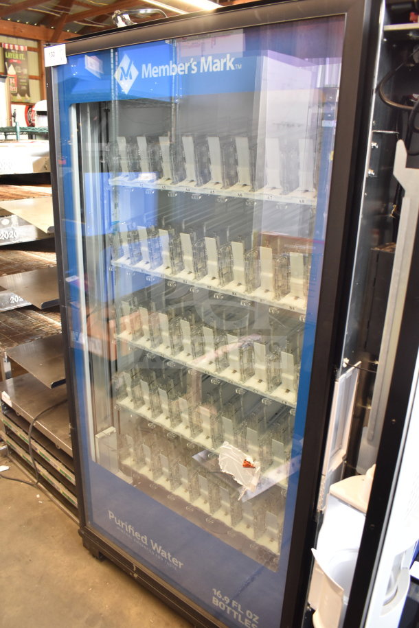 Crane 5800-4HC Commercial Bottled Drink Vending Machine with bill acceptor, 115V, 1 Phase, in good condition, empty shelves visible.
