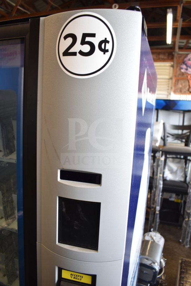 Crane 5800-4HC vending machine, accepts bills, 25¢ price, 115 volts, 1 phase, commercial use, minor visible wear.