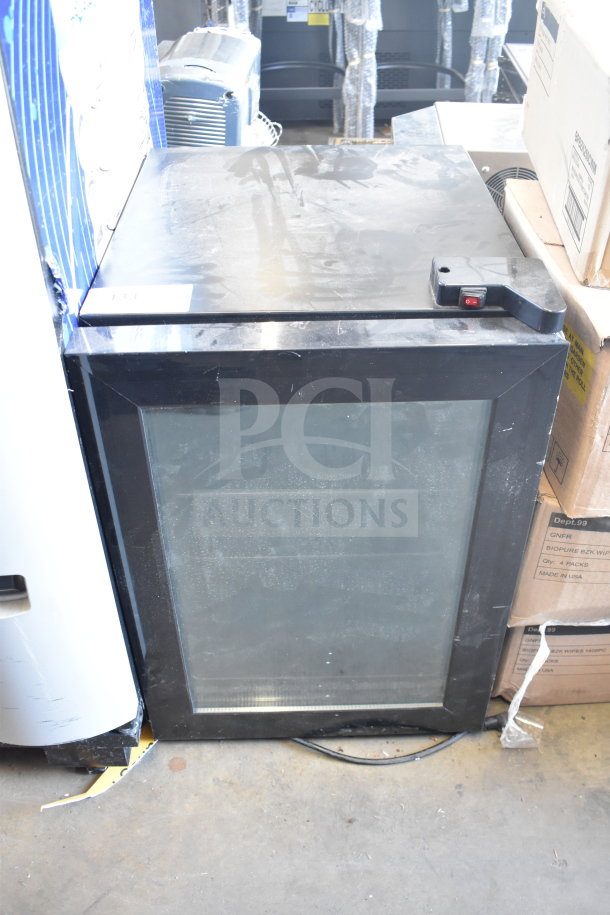 LSD-60 Mini Cooler Merchandiser, glass front, black frame, 115 volts, 1 phase, visible wear, dust on surface, power cord attached.