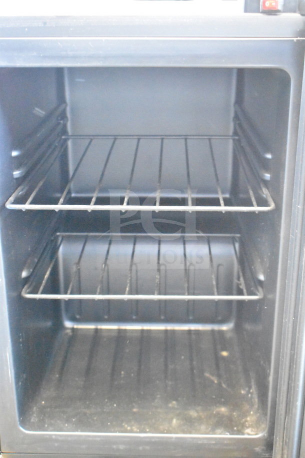LSD-60 Mini Cooler Merchandiser with two wire shelves. Model LSD-60, 115 volts, 1 phase. Good condition.