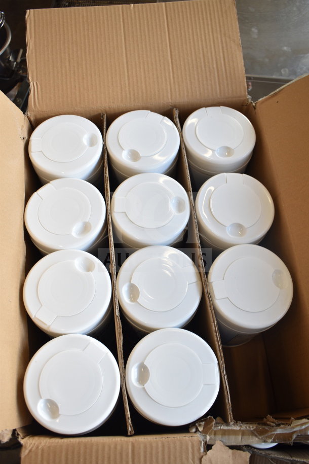 5 boxes containing 12 bottles each of BioPure Hand Wipes. Bottles are white with flip-top lids, new condition.
