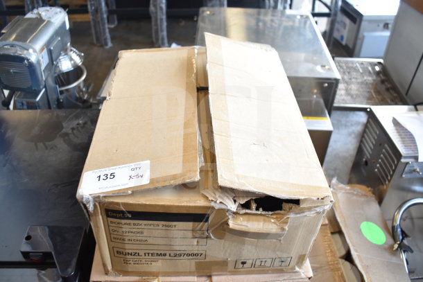 Five boxes of BioPure Hand Wipes, 12 bottles each, with visible shipping labels, slightly damaged cardboard condition.