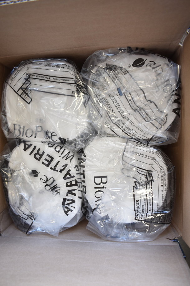 Five boxes of BioPure Hand Wipes, each containing 12 bottles, packaged in plastic and cardboard.