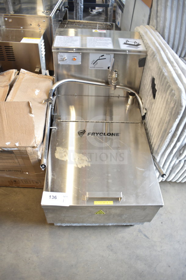 Brand new Fryclone 259OFM110 115 lb. fryer oil filter machine, 120V, 1 phase, with 2-way pump, minor dents visible.
