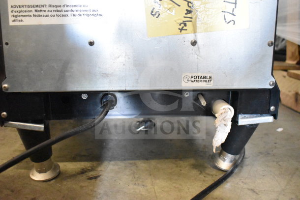 Scotsman HID207ABX-1A nugget ice machine back view showing water inlet label and electrical connections.