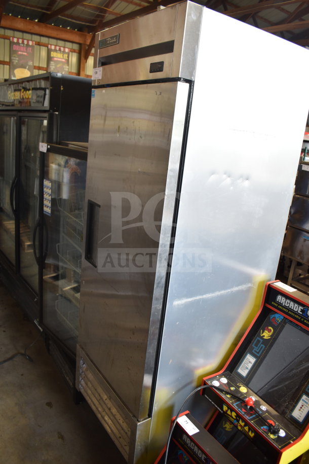 2019 True T-23F-HC single door reach-in freezer, stainless steel, 115 volts, 1 phase, excellent condition, visible True logo.
