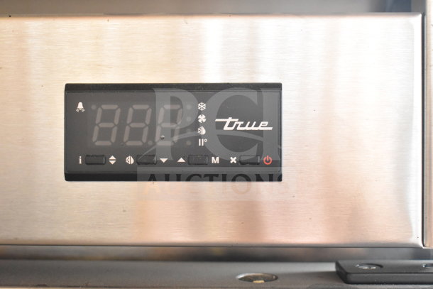 2019 True T-23F-HC freezer control panel with digital display and function buttons.