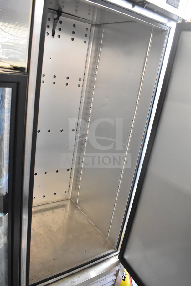 2019 True T-23F-HC commercial single door reach-in freezer, empty interior, model T-23F-HC, 115 volts, 1 phase.
